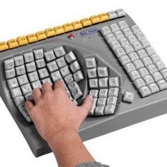 keyboard adapted for people with motricity issues, the keys are on a curved surface 